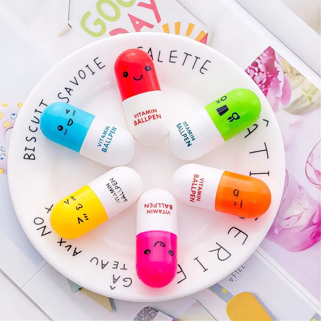 Bút bi mini hình mặt cười mới, Bút bi dạng viên nang sáng tạo, Quà tặng văn phòng phẩm cho học sinh, Bút bi hình mặt cười hoạt hình dễ thương, Mực xanh