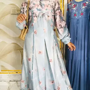 Gamis Motif Matt Lionel Richi dengan Desain Elegan dan Warna Soft Biru Muda untuk Tampilan Lebih Stylish