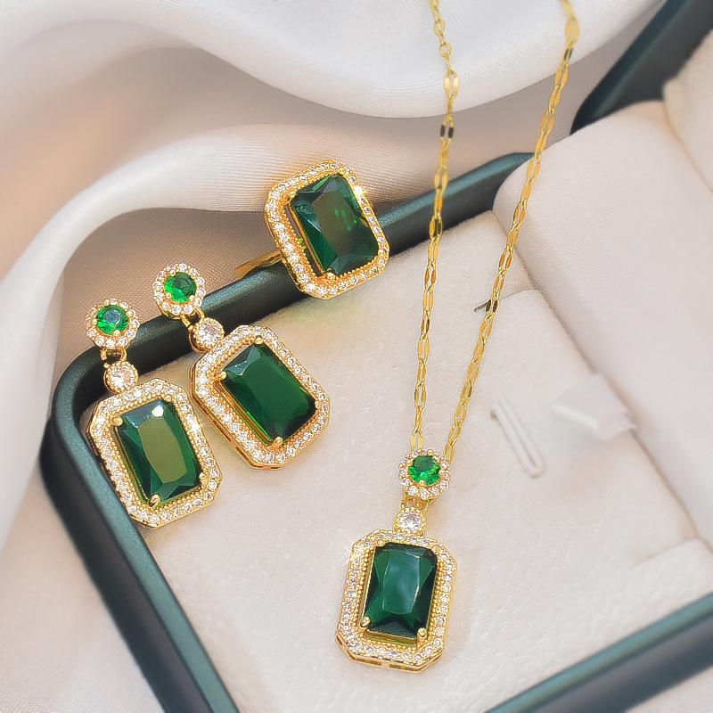Product Introduction of Emerald Set Necklace Women's High Sense Temperament Entry Lux Fashion New Ring Ear Stud Pendant Three-Piece Set Ornament 7
