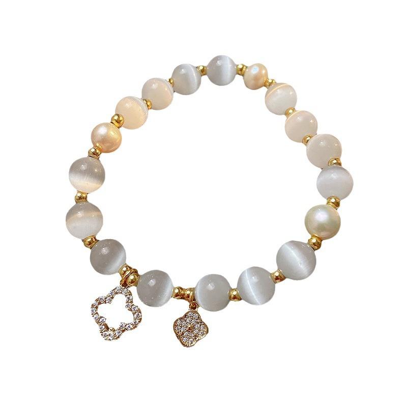 Product Introduction of Ladies' Cat Eye Stone Clover Bracelet Increases Travel Distance by 8mm 4
