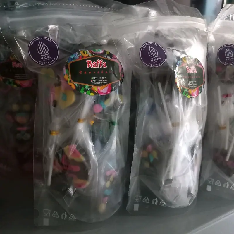 Kemasan box isi 25pcs coklat karakter permen paku 5