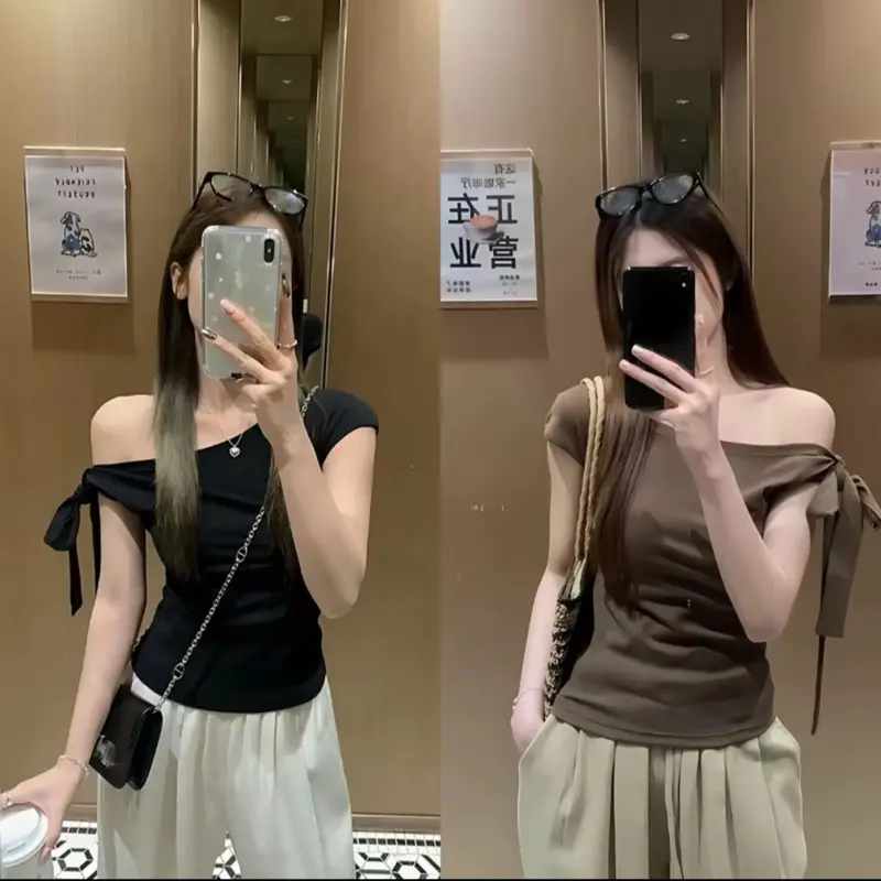 HL13 Áo thun nữ trễ vai chất liệu thun zip ôm body thiết kế thắt nơ vai aophongnu aophongbasic thoitrangnu thoitrangtre outfitnu phongcachhanquoc | BigBuy360 - bigbuy360.vn HL13 Áo thun nữ trễ vai chất liệu thun zip ôm body thiết kế thắt nơ vai aophongnu aophongbasic thoitrangnu thoitrangtre outfitnu phongcachhanquoc | BigBuy360 - bigbuy360.vn
