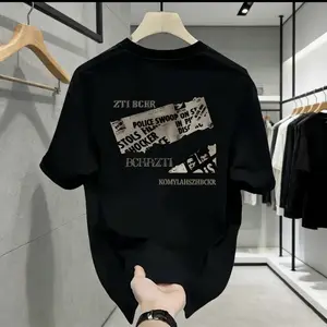 FLASH SALE gaya Jaksel！ Kaos premium dari Cotton Combed 24s， 220+gsm jaminan tebal anti tembus & adem. Desain minimalis trendy unisex untuk 24/7. Jangan lewatkan， COD！ baju trend lebaran 2026 laki laki