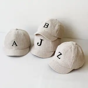Topi Anak Cewek Cowok Usia 6 Bulan - 2 Tahun INISIAL A-Z Warna Cream Dan Hitam Bahan Korduroy Bayi