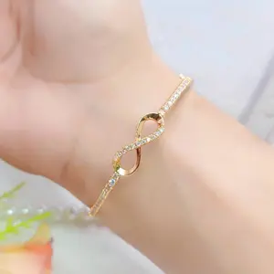 Gelang Bangle Bulat Titanium Motif Angka 8 Permata Invinity Lapis Emas