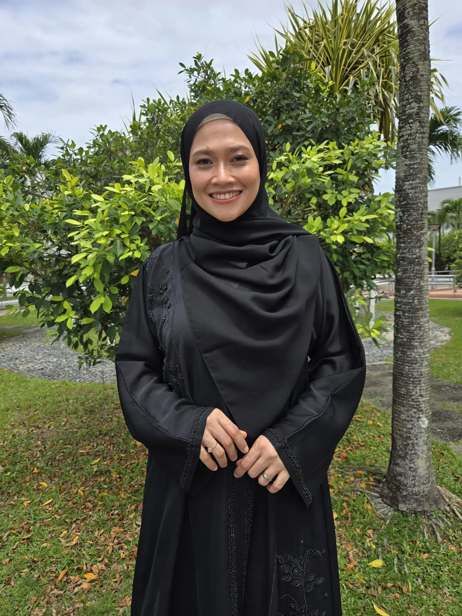 Classic black Abaya with detailed hand work for the Muslimah woman
