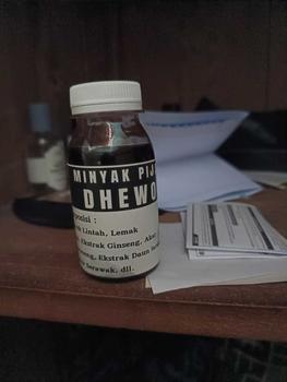 Product Review of MINYAK PIJAT TRADISIONAL MASSAGE OIL DHEWO 50ML from ** 0