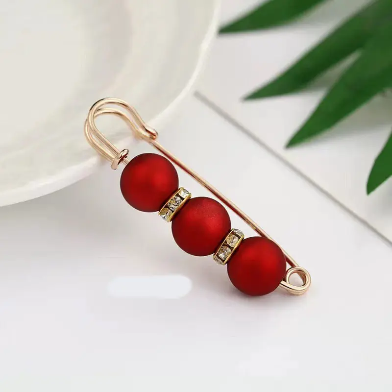Pearl waistband pin fixed clothing skirt waist reduction small anti-slip brooch waistband buckle