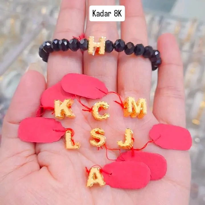 Gelang model huruf kuning variasi tali