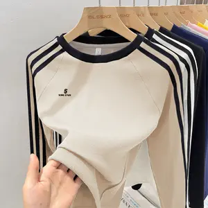 Kaos bordir crew neck lengan panjang berwarna aprikot