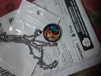 Product Review of Kalung Liontin Yin Yang Art Kaca Cembung Tali Kulit Rantai Stainless Steel from A**N J**R D**U 1