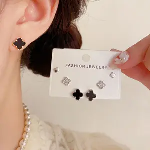 EAR PARTNER-S925 Jarum perak Set anting tiga bagian bergaya Prancis mewah ringan dengan hiasan zirkon berbentuk daun semanggi empat helai, unik, elegan, modis, sederhana, serbaguna, dan bergaya untuk wanita.