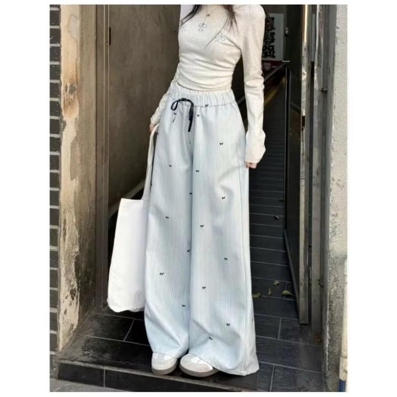 Quần ống rộng nữ kẻ sọc phối hình nơ siêu xinh chất vải đũi lạnh mềm mịn thoáng mát mặc mùa hè cho phong cách thời trang nữ tính