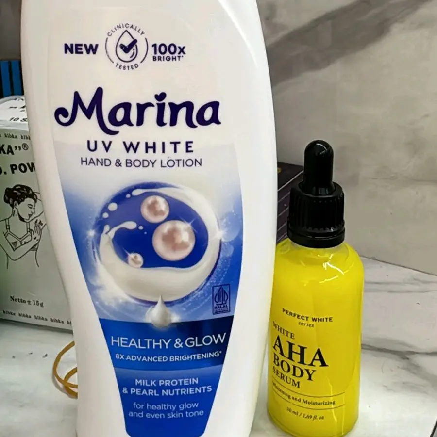 1PAKET AHA BODY SERUM 25ml & MARINA UV WHITE BIRU 450ml