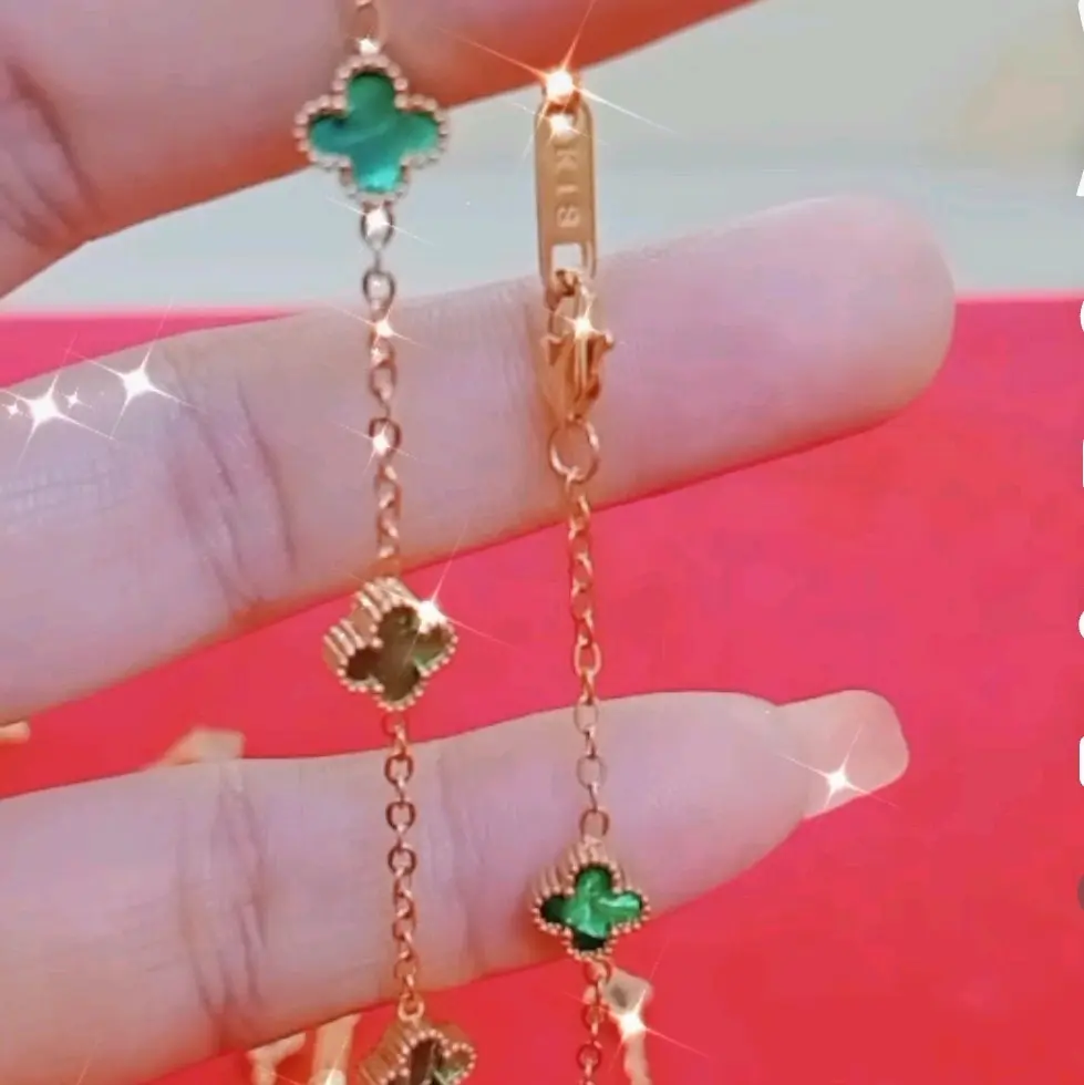 gelang emas nafisa k18 bunga hijau spr glowing mewah elegan dan cantik bgt,spr awet bisa dipakai sehari-hari,resmi ada suratnya by TOKO EMAS NAFISA _tersedia ukuran dewasa dan anak2..
