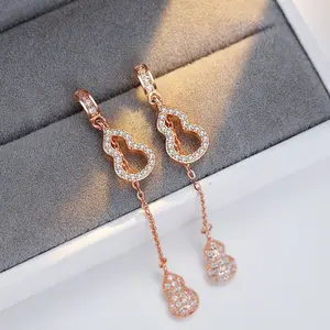 Anting Titanium Menjuntai Bentuk Labu Kristal Elegan Wanita Aksesoris Fashion Mewah Kekinian