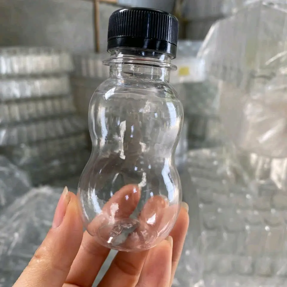 100chai tròn 100ml kèm nắp đen và trắng