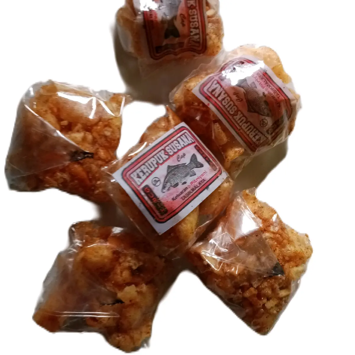 cemilan kerupuk ikan nikmst&gurih,kemasan 1 pack isi 10 bungkus cocok untuk dijual lagi di warungan. Snack Keripik Asin Makanan