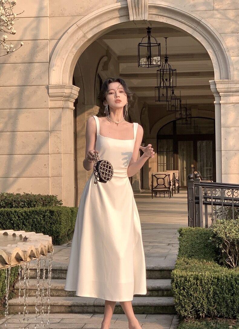 Product Introduction of Women's new slim fit mid length dress, solid color suspender dress, waist cinching, niche design for girls, women's mid length dress Casual Womenswear 22