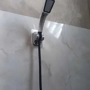 DUJIU Braket Kepala Shower Warna Perak Tanpa Bor 2026 – Pengait Dinding Kamar Mandi Praktis Rumah Tangga Sudut Adjustable Bebas Arah Anti Lembab Kuat Kokoh Cocok Semua Jenis Shower