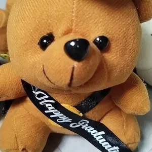 Boneka Wisuda Teddy Bear 12cm dengan Topi Graduasi dan Pita Happy Graduation Warna Putih, Pink, Kuning, dan Cokelat