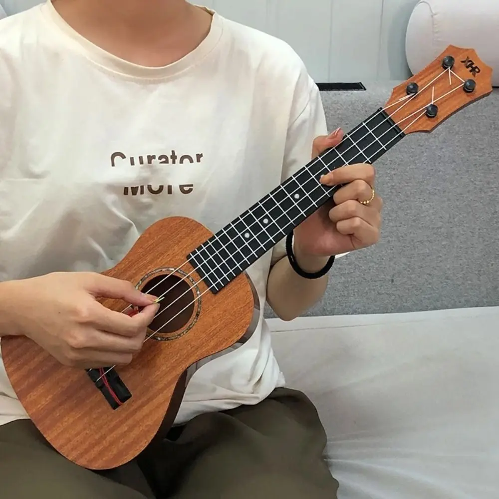 Đồ Chơi Nhạc Cụ Đàn Ukulele, Bộ 4 Dây, Mô Phỏng Cổ Điển, Bền Và Có Thể Chơi Được, Thích Hợp Cho Trường Học Và Chơi Trò Chơi, Cỡ Nhỏ Lý Tưởng Cho Người Mới Bắt Đầu, Đồ Chơi Yukrili