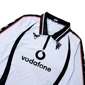 JERSI EMYU MANCHESTER UNITED LONGSLEEVE PUTIH HITAM