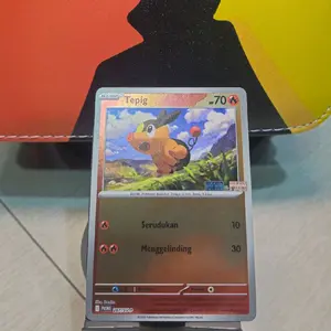 Gambar tersebut menampilkan kartu Pokémon Trading Card Game (TCG) dari Pokémon bernama Tepig.
