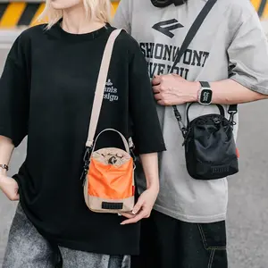 Tas botol air olahraga luar ruangan tas serba guna untuk botol air ponsel bergaya gunung tas selempang sepeda dengan tali serut tas jinjing warna-warni untuk pria dan wanita