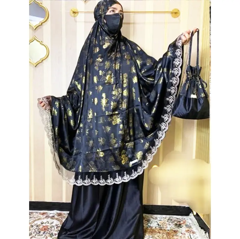 Mukena Kemewahan Bahan Sutra Hitam Motif Gold & Silver Ukuran Jumbo 2