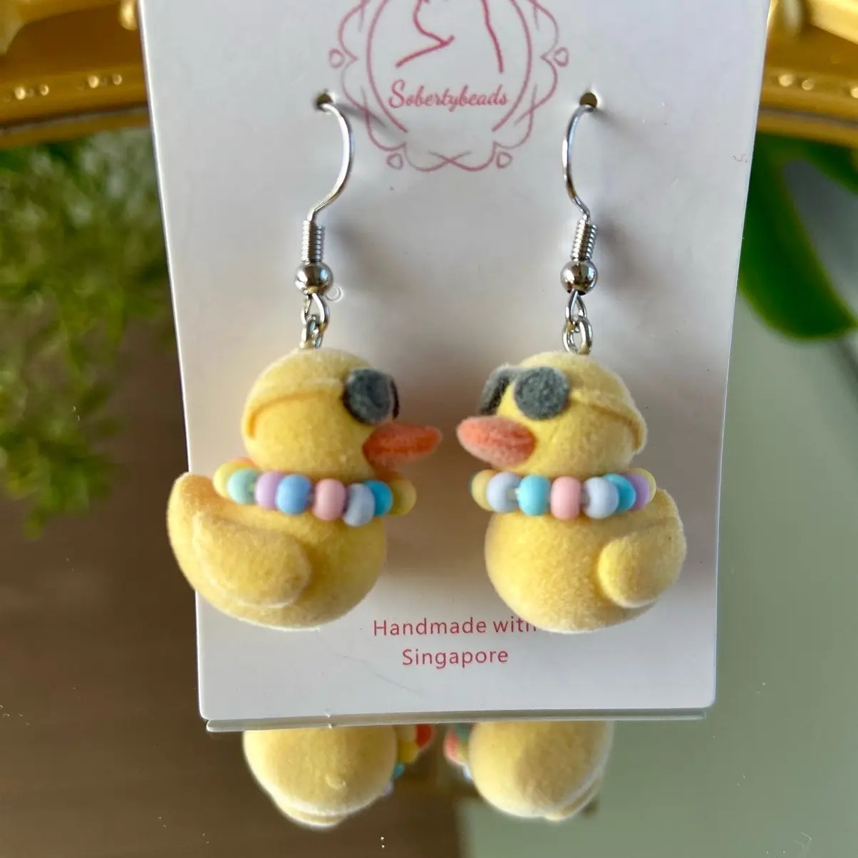 Cool duck with beaded necklace