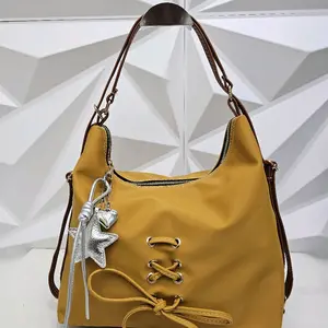 CanoninLove Lola tas multifungsi dengan ikatan tali yang menambah cantik dan elegan