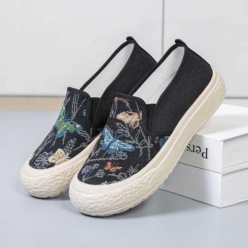 NW059 Sepatu Slip On Wanita Motif Kupu-Kupu 5