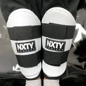 Deker / Pelindung kaki NXTY untuk pencak silat dan Tae Kwon Do
