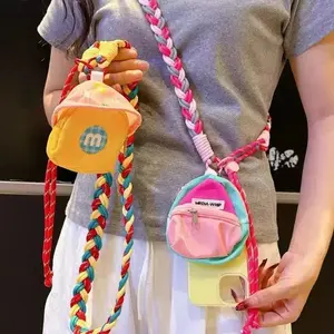 Tali selempang yang trendi dan serbaguna - berbagai gaya, tempat ponsel praktis. Wanita