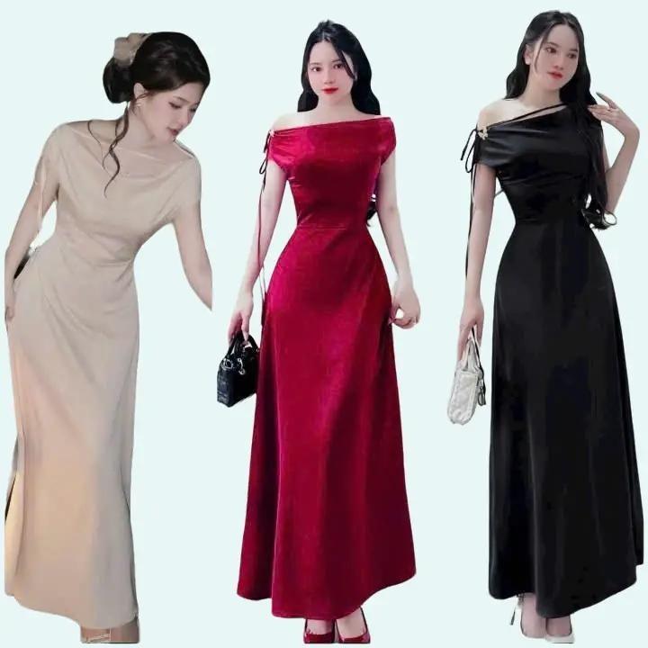 Đầm váy nữ lụa nhung thiết kế tay ngắn cổ trễ vai phối nơ dáng xòe dài sang chảnh dành cho các nàng diện đi chơi. 