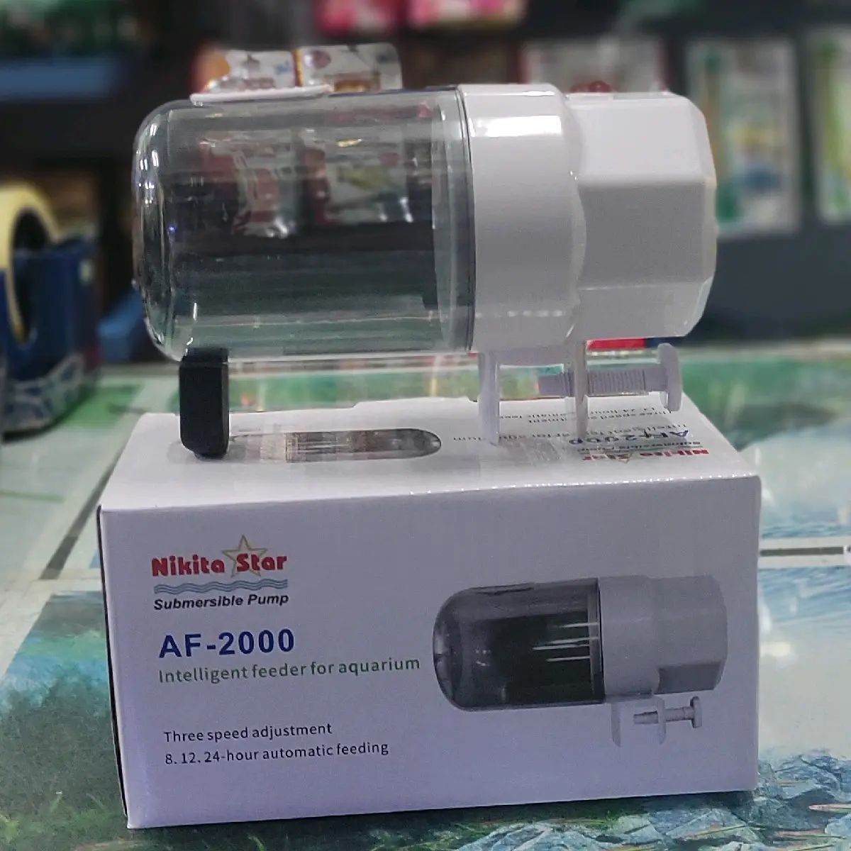 FOOD TIMER AUTO FEEDER PEMBERI MAKAN IKAN OTOMATIS NIKITA STAR AF 2000