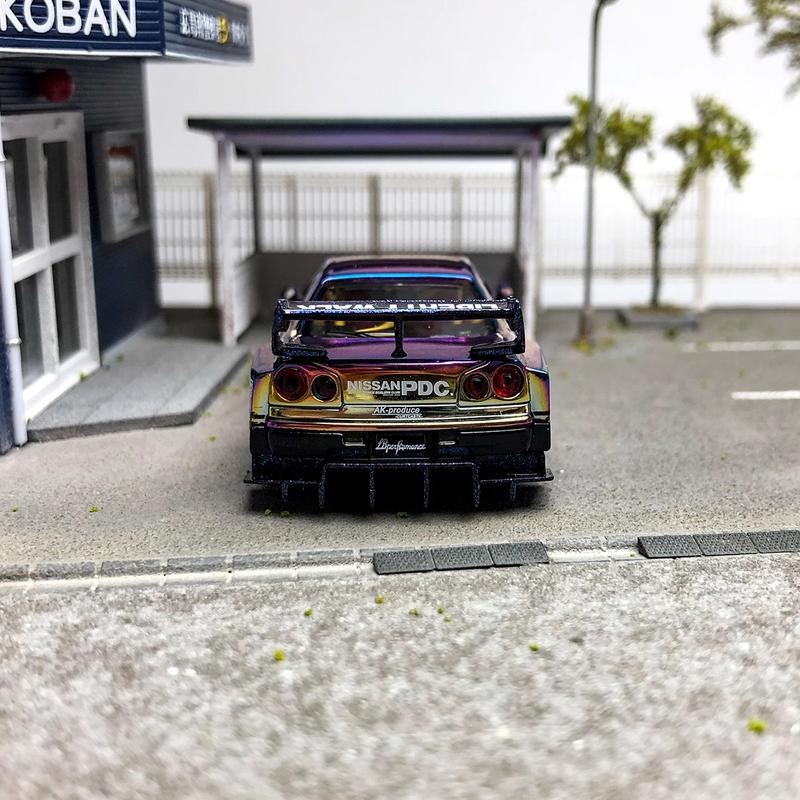 Product Introduction of CM Model 1 64 Nissan ER34 electroplated seven color delivery wheel hub alloy car model Alloy Diecast Car Model Collection 9
