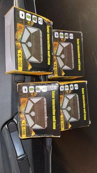 Product Review of ( 4 x Sided ) Waterproof 100 LED 3 Modes Solar Motion Sensor Light Outdoor Wall Lighting from 𝘼**𝙉 2