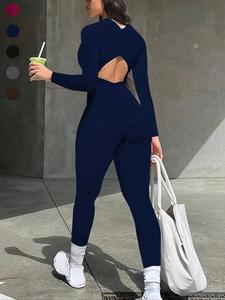 Mono casual clásico de cuello redondo y espalda descubierta con cierre de cremallera y manga larga para mujer, moda nueva de primavera verano de una pieza