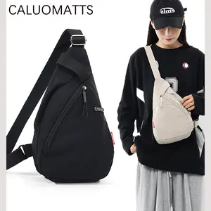 【CALUOMATTS】Tas Dada Unisex Street Chest Bag - Tas dada minimalis untuk pria dan wanita untuk bersepeda dan aktivitas sehari-hari Multi-kompartemen berkapasitas besar Hitam Kanvas