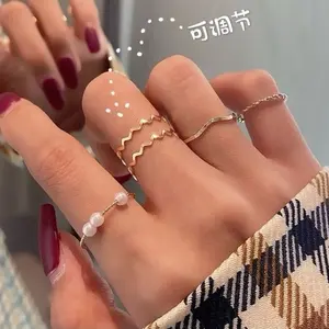 ￼[F4] Cincin NADINE MUTIARA 5 Set Fashion (Set ring) Korean version of simple personality wild geometric pearl ring 5pcs / Set Cincin Mutiara Gaya Korea Minimalis Elegan Alloy Paduan