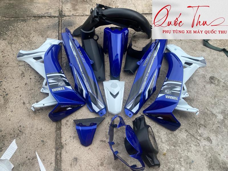 dàn áo sirius màu xanh Gp - trắng, chưa kèm pha đèn dán sẵn tem, hàng 1/2.