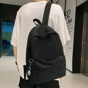 StarCollektion tas punggung distro pria dan wanita (polos hitam) tas punggung simple murah dan praktis cocok untuk pemakaian skolah dan acara formal lainnya dengan bahan dinnir 300 yg berkualitas