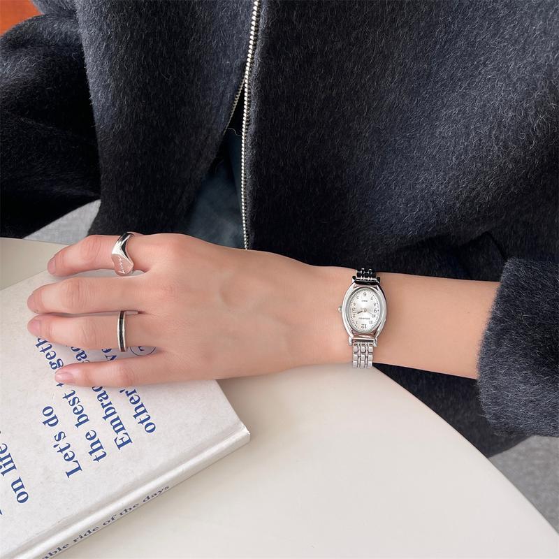 Product Introduction of Đồng Hồ Đồng Hồ Đeo Tay Nữ, Thiết Kế Thanh Lịch, Phong Cách Cổ Điển Mặt Số Hình Bầu Dục, Đồng Hồ Thạch Anh Tinh Tế Thích Hợp Cho Học Sinh, Tặng Kèm Dụng Cụ Tháo Liên Kết Dây Đeo 14