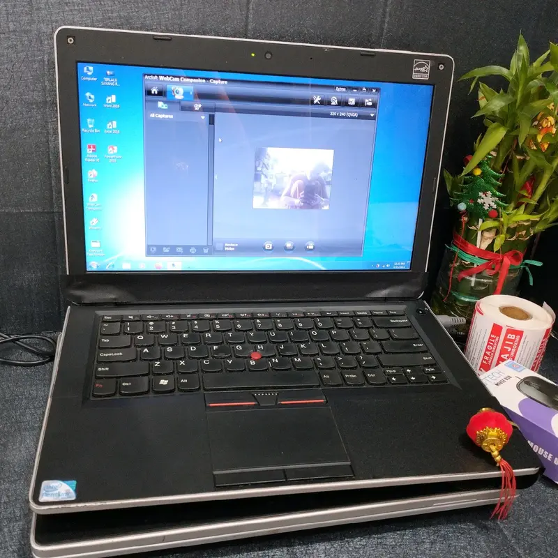 LaptopE4O seri i5 ram 4gb Hdd 320gb Windows 7 1