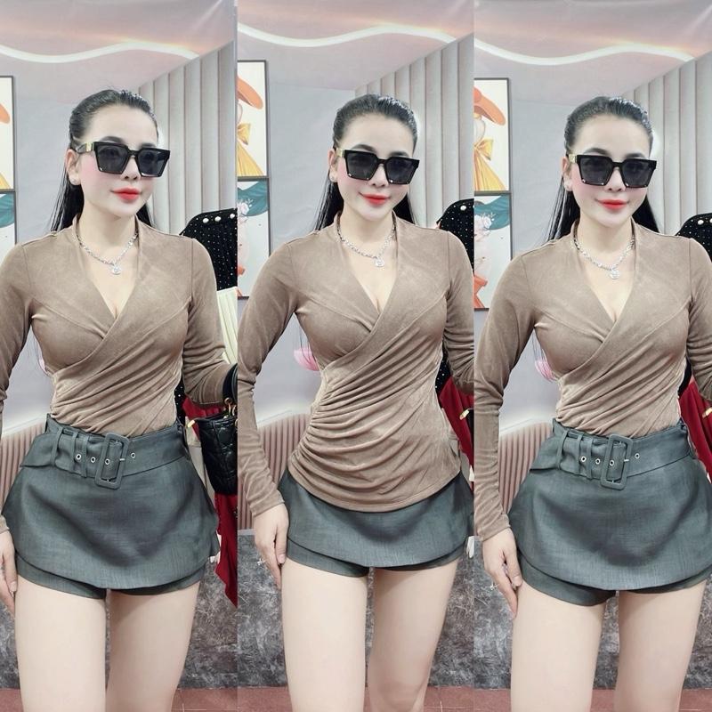 Áo Thun thiết kế Cổ leo đắp chéo nhún eo che bụng tay dài ôm body tôn dáng sang trọng . Chất liệu : Thun nhũ ánh kim cao cấp mẫu về đủ size