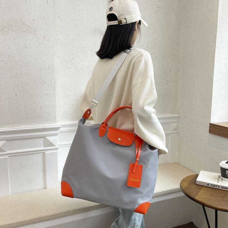 Product Introduction of 2023 Large Capacity Women's Travel Bag Waterproof Sports Gym Bag Outdoor Shoulder Crossbody Bag Female Handbag Weekend Gym Bag 4