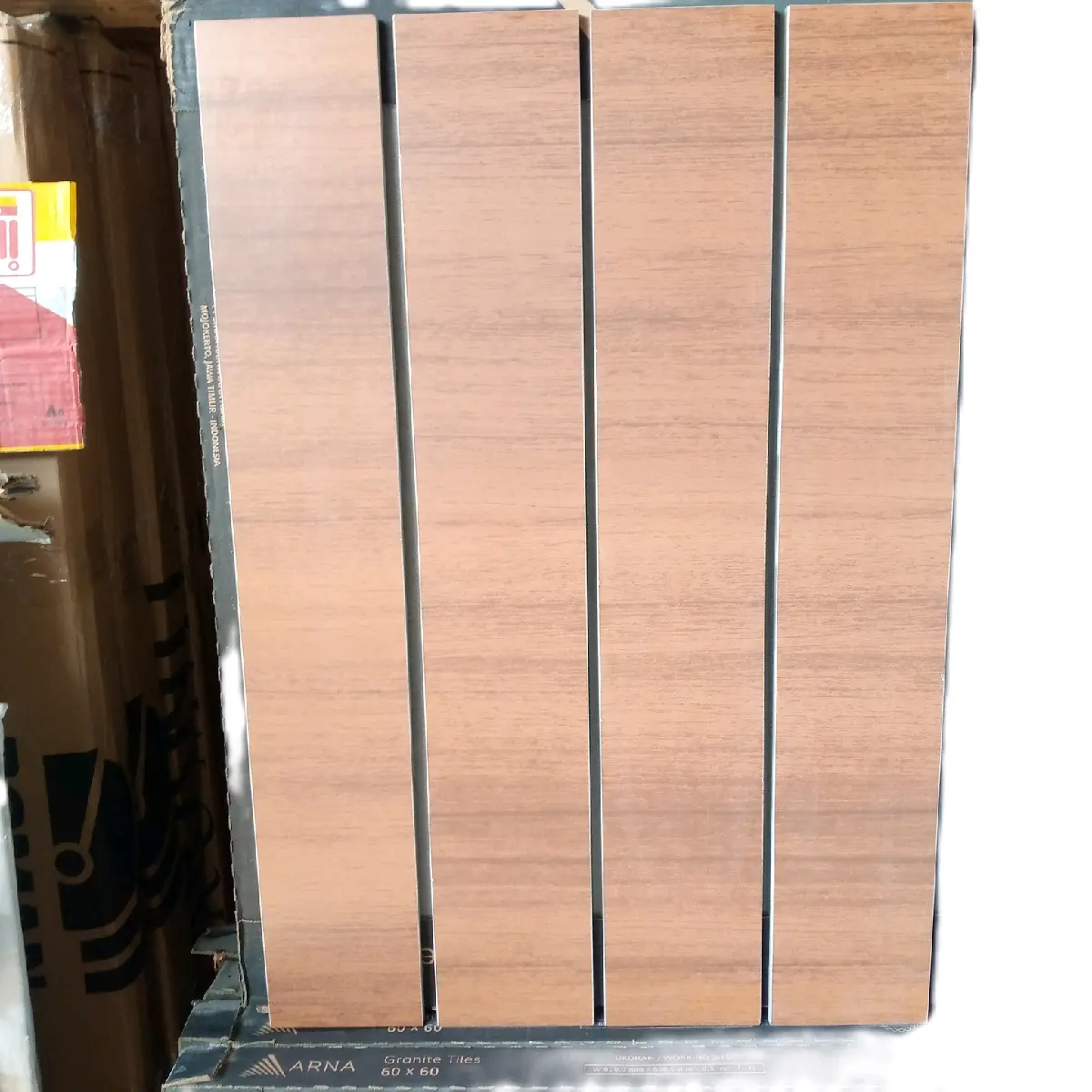 GRANIT PLIN 10X60 MOTIF SERAT KAYU Minimalis