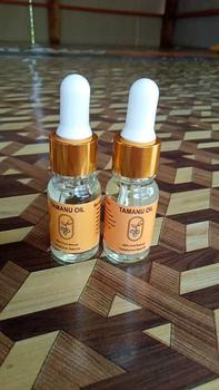 Product Review of PAKET 2 TAMANU OIL MENCERAHKAN WAJAH GLOWING FLEKHITAM from m** 1